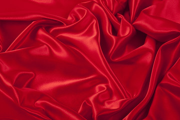 Obraz premium Red satin fabric background.