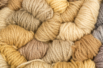 Golden brown wool yarn background.
