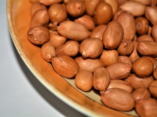 Close up of peanuts on a plate