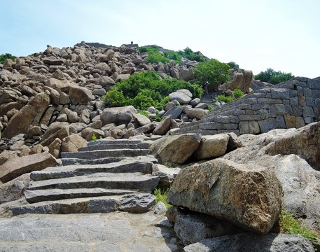Old stone stairway steps in ruins of Gingee Fort (built on rocks) in Tamil Nadu.