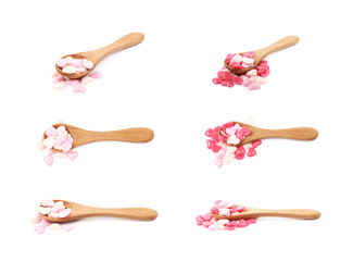 Spoon full of heart beads isolated