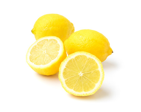 Closeup lemon fruit and slice on white background