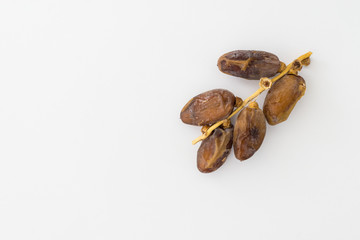Dates or kurma over white background