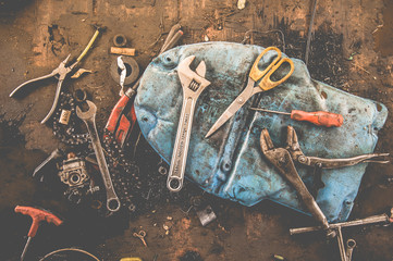 Many Tools on dirty floor, Set Craftsman tool , mechanical tools. Professional  mechanic using different tools for working in auto repair service.