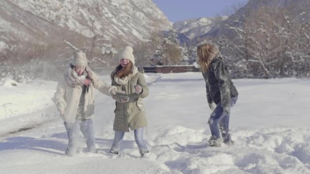 Teens Have Fun Throwing Snow At Each Other In Utah Mountains
