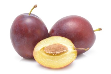 fresh plums on a white background