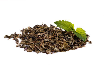 Green and black tea leaves  on white background