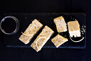 Napoleon cake on a dark background