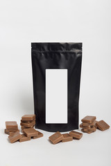 cosmetic packaging black in colour with cubes of wax for hair removal