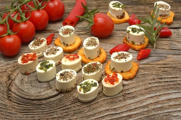 Greek feta cheese pieces on wooden background