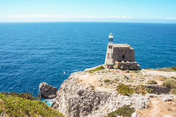 Fototapeta na wymiar The tower and lighthouse of Punta Campanella at Sorrento