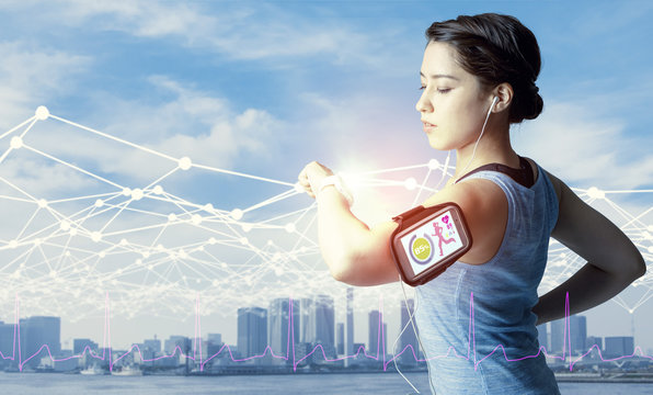 running woman with smart watch and smart phone. wearable computing concept.