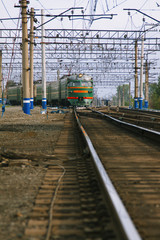 Approaching trains on the railway. A train approaches the station.