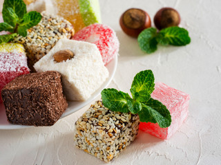 Turkish delight on white rustic background