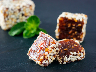 Turkish delight on black rustic background