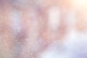 Snowfall texture of snowflakes on blurred background