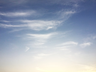 Soft white clouds against blue sky background and empty space for your design