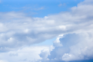 White clouds against a blue sky