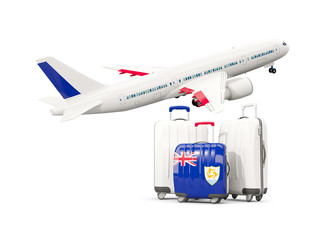 Luggage with flag of anguilla. Three bags with airplane