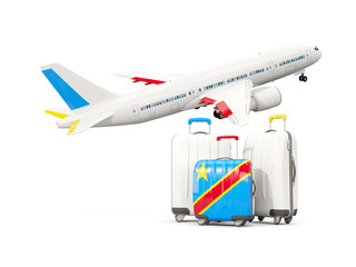 Luggage with flag of democratic republic of the congo. Three bags with airplane