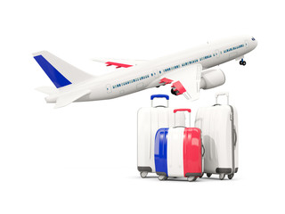 Luggage with flag of france. Three bags with airplane