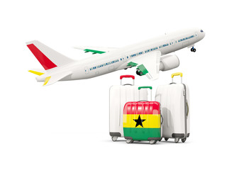 Luggage with flag of ghana. Three bags with airplane