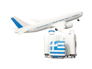 Luggage with flag of greece. Three bags with airplane