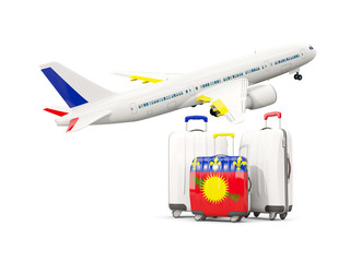 Luggage with flag of guadeloupe. Three bags with airplane