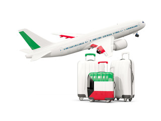 Luggage with flag of kuwait. Three bags with airplane