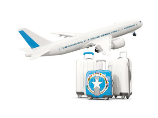 Luggage with flag of northern mariana islands. Three bags with airplane
