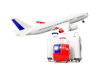 Luggage with flag of taiwan. Three bags with airplane