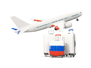 Luggage with flag of russia. Three bags with airplane