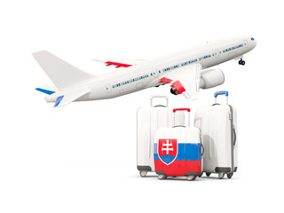 Luggage with flag of slovakia. Three bags with airplane