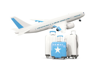 Luggage with flag of somalia. Three bags with airplane
