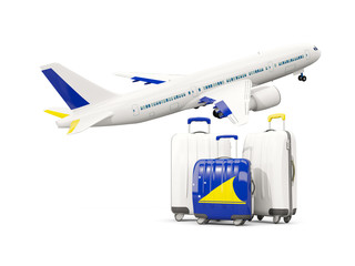 Luggage with flag of tokelau. Three bags with airplane