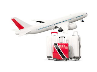 Luggage with flag of trinidad and tobago. Three bags with airplane