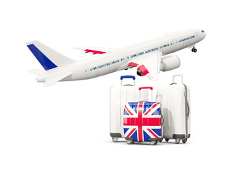 Luggage with flag of united kingdom. Three bags with airplane