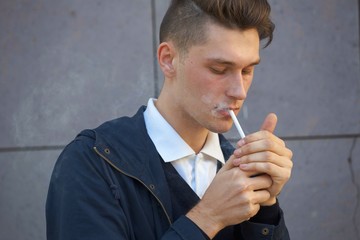 Hipster guy walking down the street, urban style
