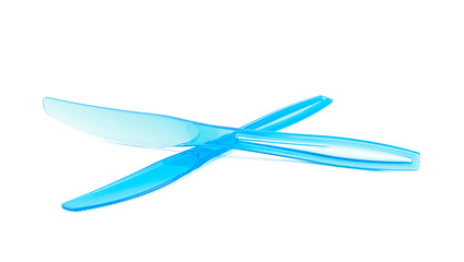 Pile of disposable knives isolated