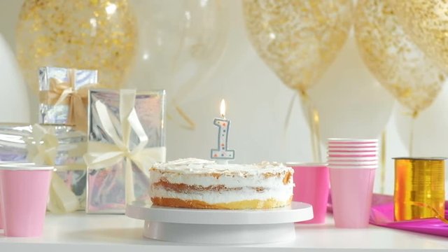 Birthday cake with one candle. First year 1080p fullHD