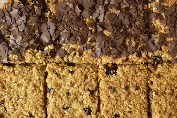 Black and white Flapjack - delicious bar with oatmeal, dried cranberry and dark chocolate