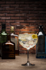 Gin tonic on a wooden background