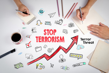 Stop terrorism text on white table