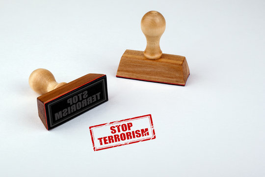 Stop terrorism rubber stamper with wooden handle Isolated on white background 