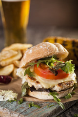 Deluxe burger on wooden table