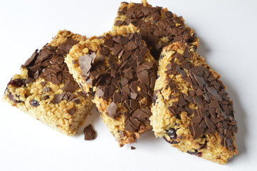 Black and white Flapjack - delicious bar with oatmeal, dried cranberry and dark chocolate