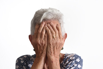 Fototapeta premium Woman covering his face with her hands