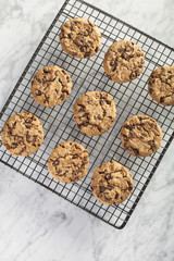 Cookies on a cooling rack over a marble table