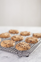 Cookies on a cooling rack over a marble table