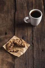 Coffee cup and Cookies on wooden table